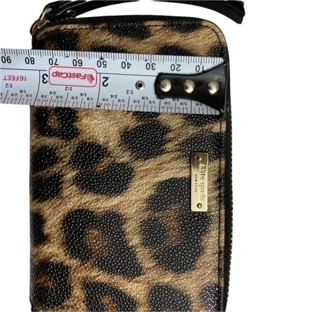 Kate spade black gold animal print wristlet